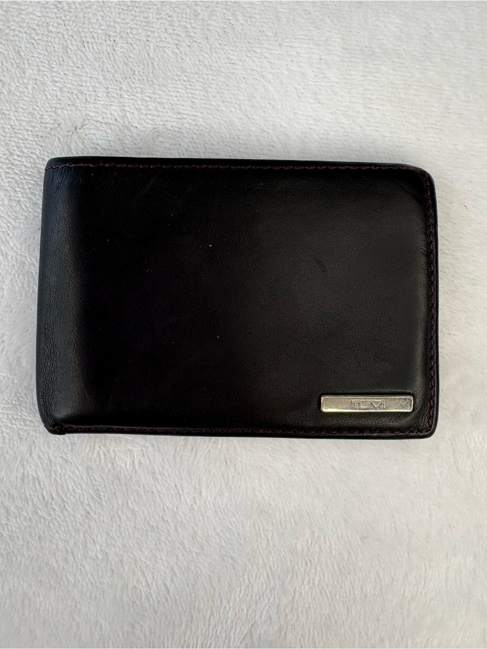TUMI Black & Burgundy Leather Wallet